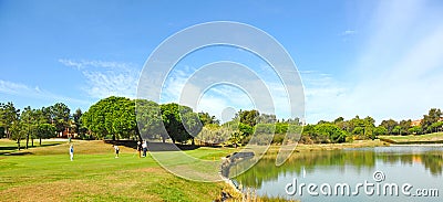 Players in the golf course of Islantilla, Andalusia, Spain Editorial Stock Photo