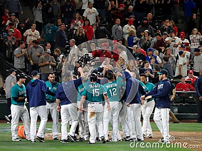Players of home team Mariners celebrating winning game at home p Editorial Stock Photo
