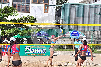 Players are playing in a match in the Women beach volleyball tournament in Nha Trang city Editorial Stock Photo