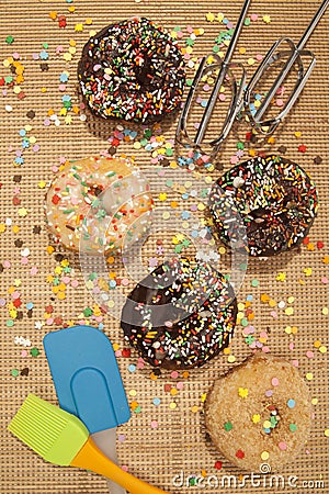 Playful, Colorful Donuts and cooking tools Stock Photo