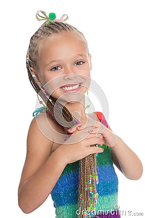 Playful girl holding her dreadlocks Stock Photo