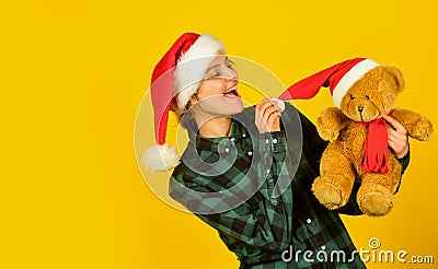 Playful lady smiling face. Play with toy. Santa Claus. Pretty woman celebrate christmas. Christmas memories from Stock Photo