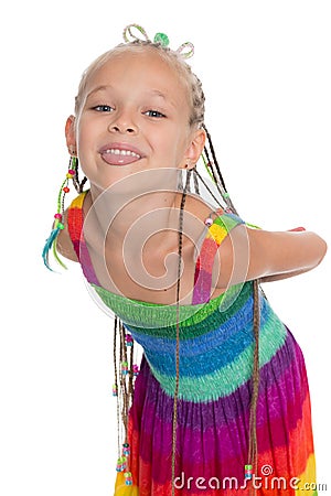 Playful little girl shows tongue Stock Photo