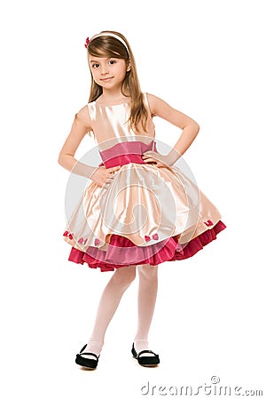 Playful little lady in a dress Stock Photo