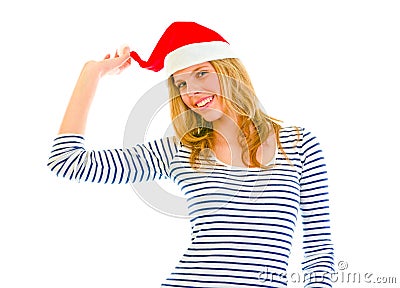Playful lovely teen girl in Santa hat Stock Photo