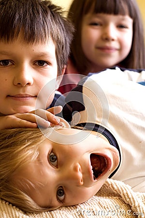 Playful Siblings Stock Photo