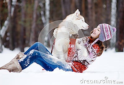 Playful woman with dog Stock Photo