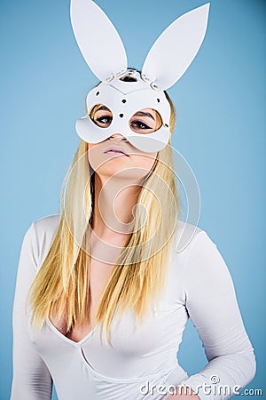 Playful woman rabbit white ears bodysuit lingerie. Sexual role game. Sex toys and accessories. Erotic bunny. Sexy blonde Stock Photo