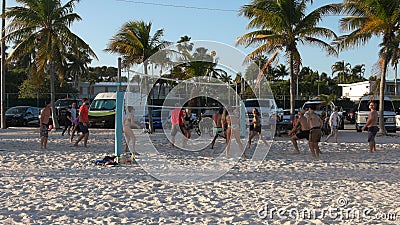 Playing Beach Ball on Higgs Beach Key West - KEY WEST, FLORIDA - FEBRUARY 14, 2022 Editorial Stock Photo