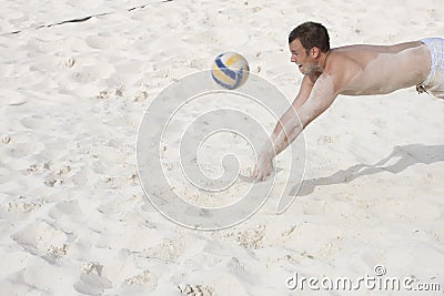Playing Beach Volleyball Stock Photo