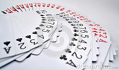 Playing cards of hearts, diamonds, clubs, spades Stock Photo