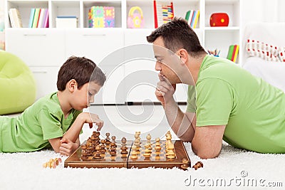 Playing chess with dad Stock Photo