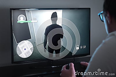 Playing console games or video game addiction concept. Stock Photo