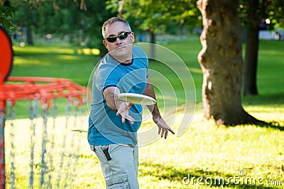 Playing disc golf Stock Photo