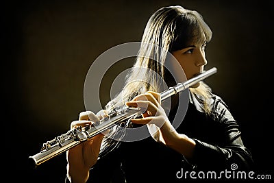 Playing flute player Stock Photo