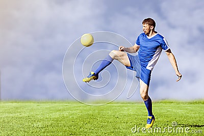 Playing football player Stock Photo