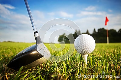 Playing golf. Club and ball on tee Stock Photo