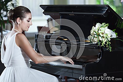 Playing piano Stock Photo