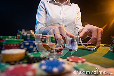 Playing poker in a big casino. Online business playing cards, big bets and money. Casino background. Winning and success, risk and Stock Photo