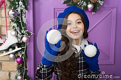 Playing with snowballs. Merry christmas and happy new year. Decor accessory. Christmas party. Cheerful girl having fun Stock Photo