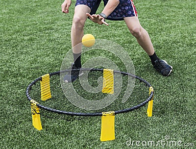 Playing spike ball Stock Photo