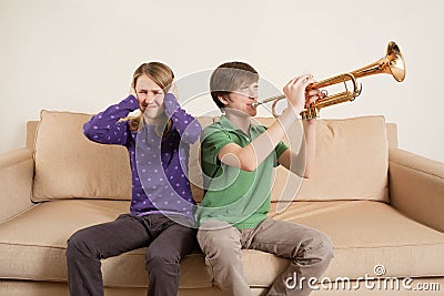 Playing trumpet badly Stock Photo