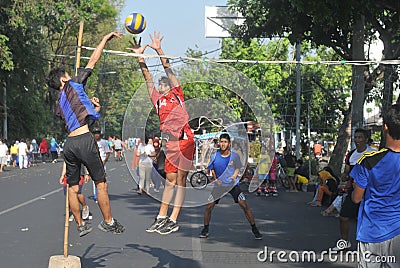 Playing volleyball in the streets Editorial Stock Photo