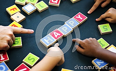 Playing wooden alphabets letters vocabulary game Stock Photo