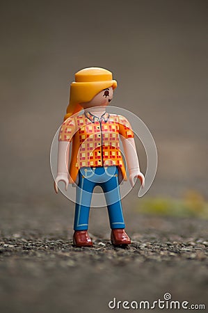 PLaymobil character standing on the road in outdoor Editorial Stock Photo