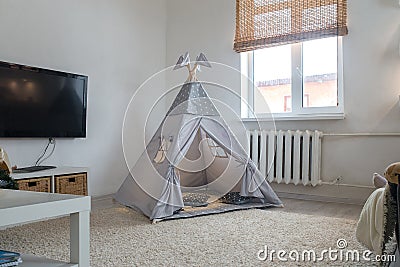 Playroom for kids with Teepee Stock Photo