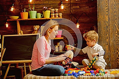 Playschool concept. Playschool kid play with mother. Playschool activities. Playschool education and child care Stock Photo