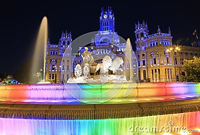 The Plaza Cybeles, palace and fountain illuminated at dusk in madrid, Spain Editorial Stock Photo