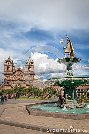 Plaza de Armas with Inca Fountain and Compania de Jesus Church - Cusco, Peru Editorial Stock Photo