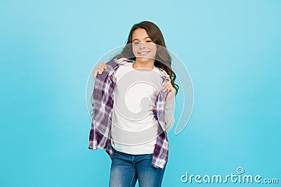 Pleasant emotions. stylish teen girl turquoise background. pretty teen girl with long hair, fashion. kid hairdresser Stock Photo