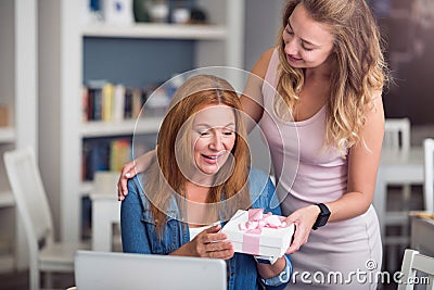 Pleasant mother and daughter resting in the cafe Stock Photo