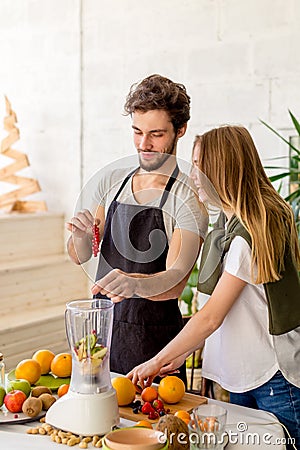 Pleasant pasttime with a boyfriend. positive atmosphere in the kitchen Stock Photo