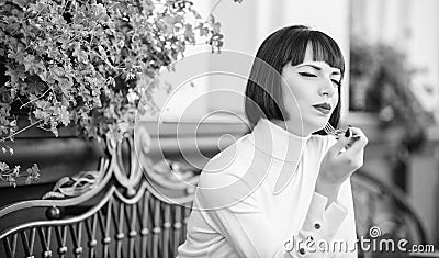 Pleasant time and relaxation. Delicious gourmet cake. Woman makeup face dreamy brunette eat cake cafe terrace background Stock Photo