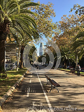 A pleasant walk in Barcelona near a modern building... Editorial Stock Photo