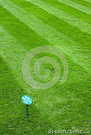 Please keep off the grass Stock Photo