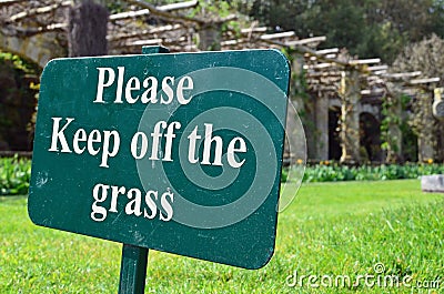 Please keep off the grass sign. Stock Photo