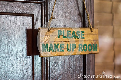 Please make up room sign on door knob in hotel Stock Photo