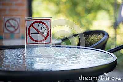 please Stop smoking concept No smoking sign in the coffee shop g Stock Photo