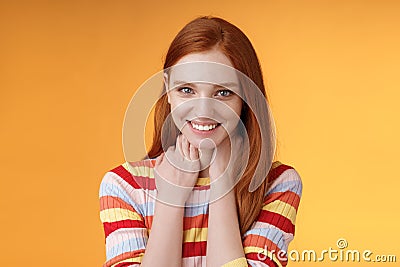 Pleased happy tender feminine redhead gorgeous girl blushing flirty giggle gazing camera smiling broadly touching neck Stock Photo