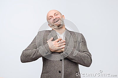 Pleased male glad to recieve compliment from woman. Stock Photo
