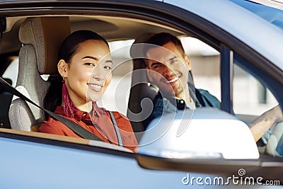 Nice cheerful woman looking at you Stock Photo