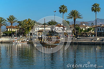 A pleasure boat for the entertainment of tourists stands in the port of Side Editorial Stock Photo