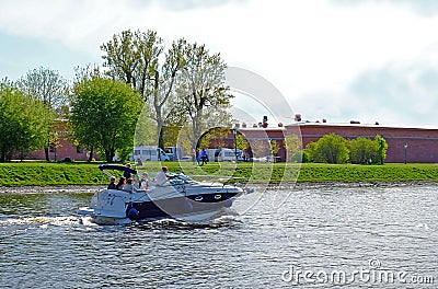 Pleasure boat with the river good Sunny weather. Vacationers tourists. Editorial Stock Photo