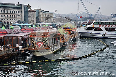 Pleasure boats, cafe on the water, Istanbul Editorial Stock Photo