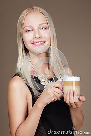 Pleasure. Woman Blonde holding Cup of Morning Cofee Stock Photo