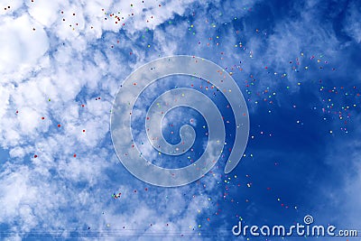 Plenty of multicolored balloons in the blue sky Stock Photo